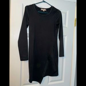 Long sleeve black dress.